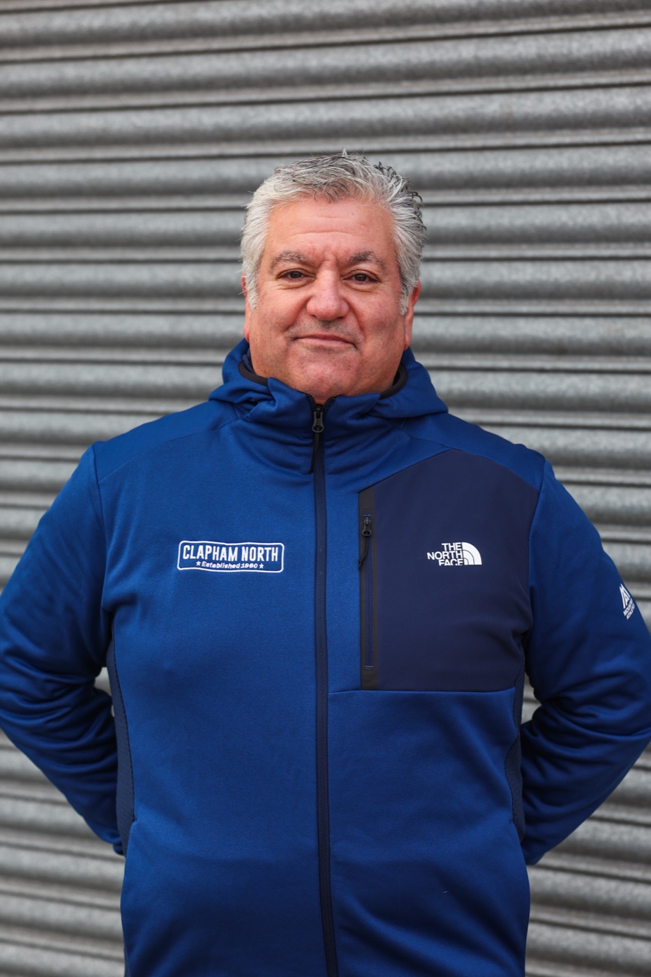 George Grant helmeted in his Team Clapham North race suit