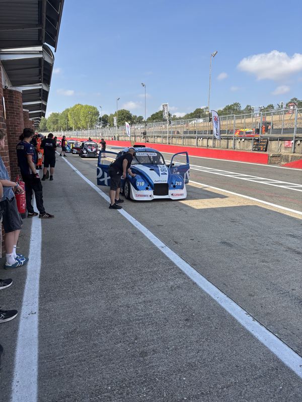 Fun Cup cars in the pit lane before the race